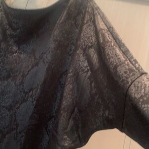 WHBM black dolman sleeve top with sheen and tapered bottom